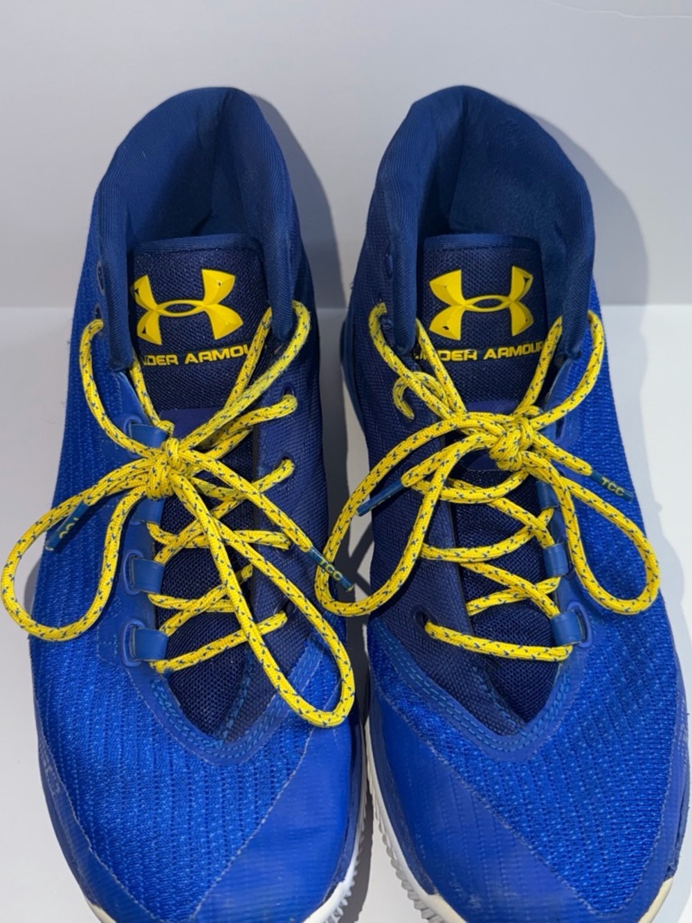 Under Armour Men’s Royal Blue Athletic Shoes with Yellow Accents
